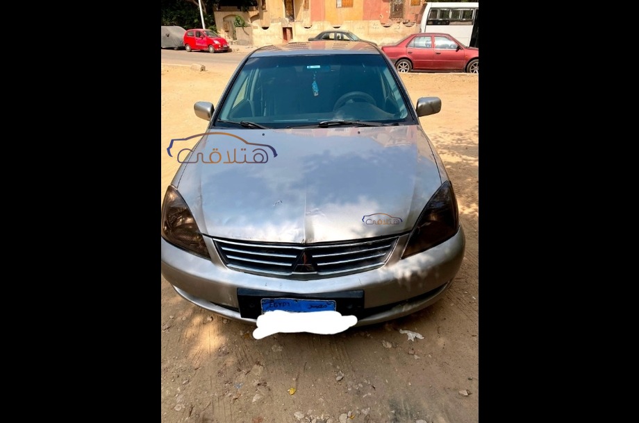 Lancer Puma Mitsubishi فضي