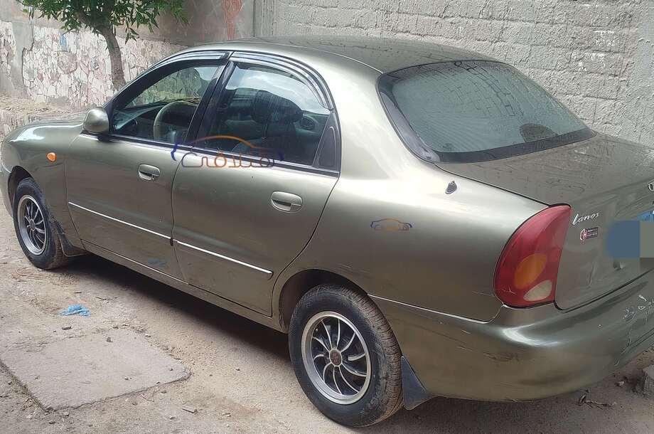 Lanos Daewoo زيتوني