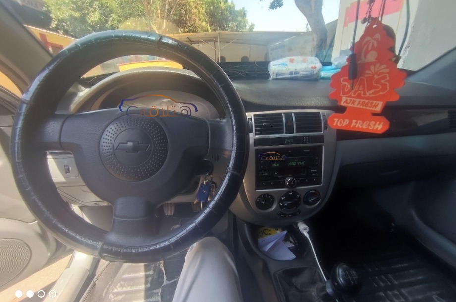 Optra Chevrolet رمادي