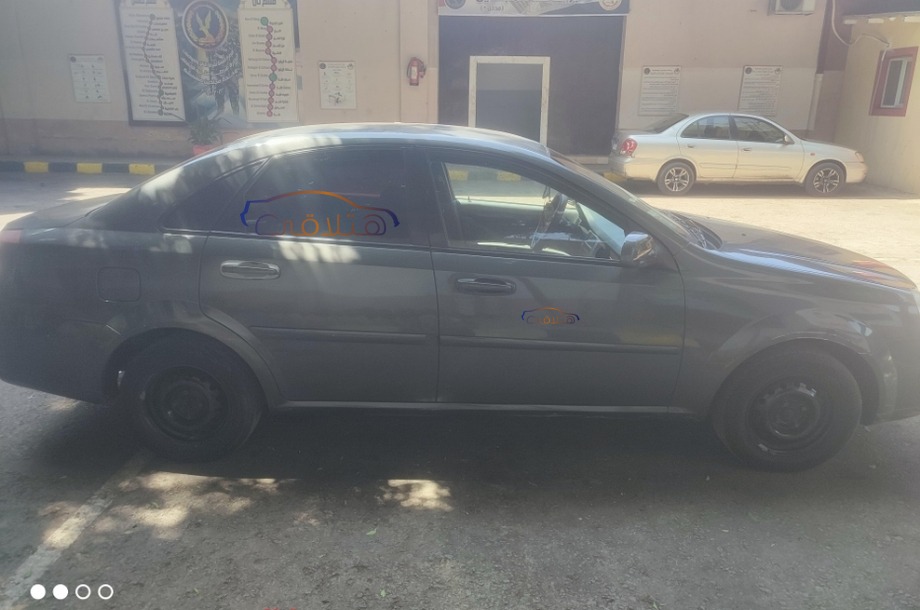 Optra Chevrolet رمادي