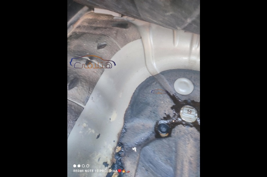 Optra Chevrolet رمادي