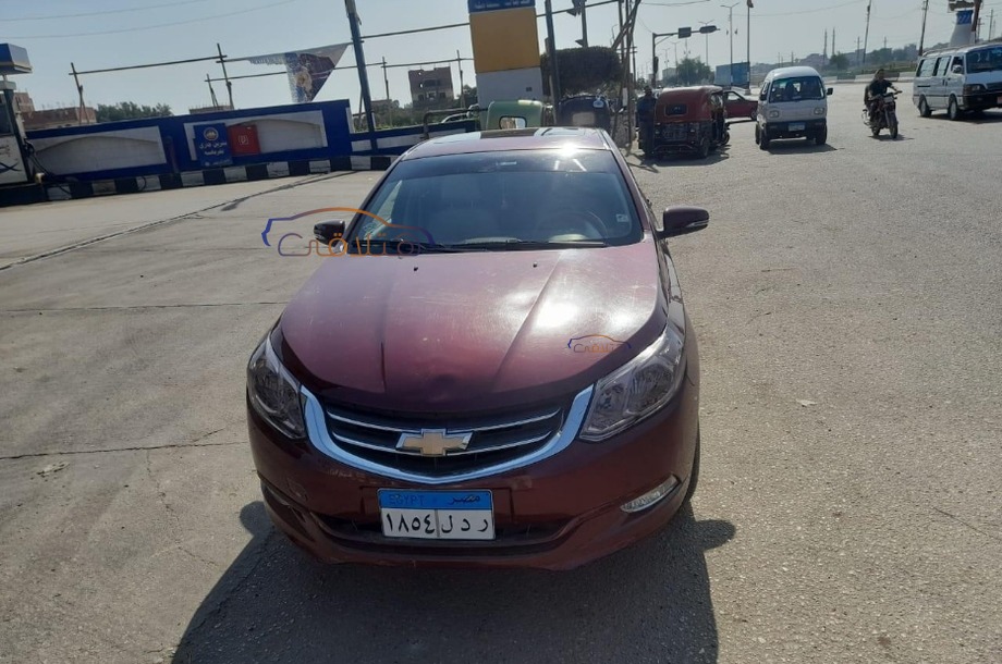 Optra Chevrolet احمر غامق