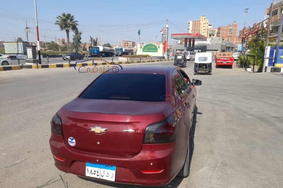 Optra Chevrolet احمر غامق