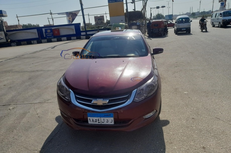 Optra Chevrolet احمر غامق