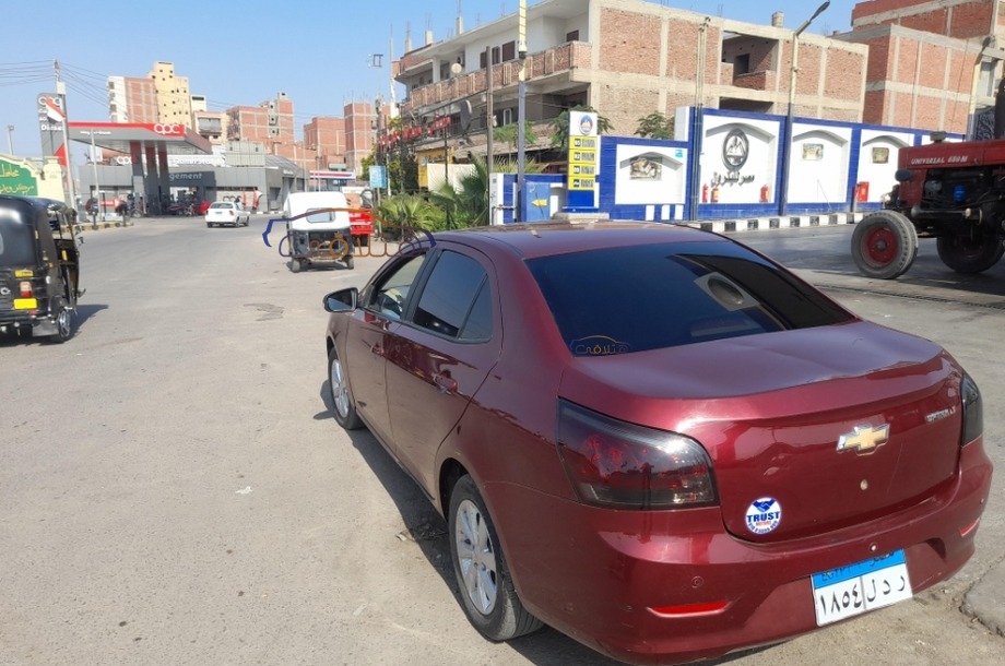 Optra Chevrolet احمر غامق