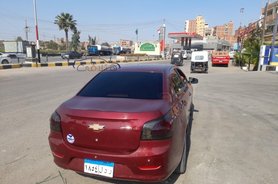 Optra Chevrolet احمر غامق