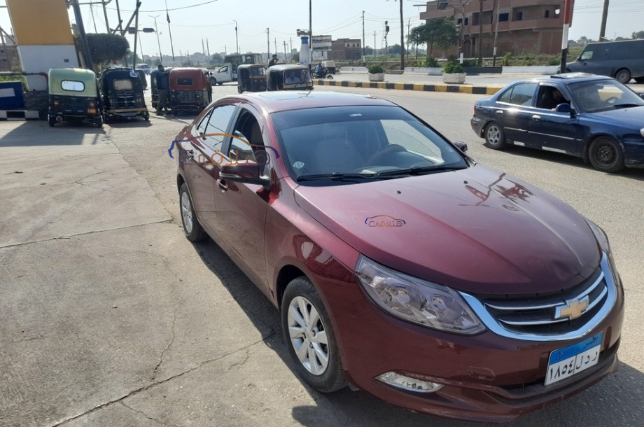 Optra Chevrolet احمر غامق