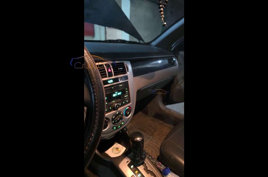 Optra Chevrolet أسود