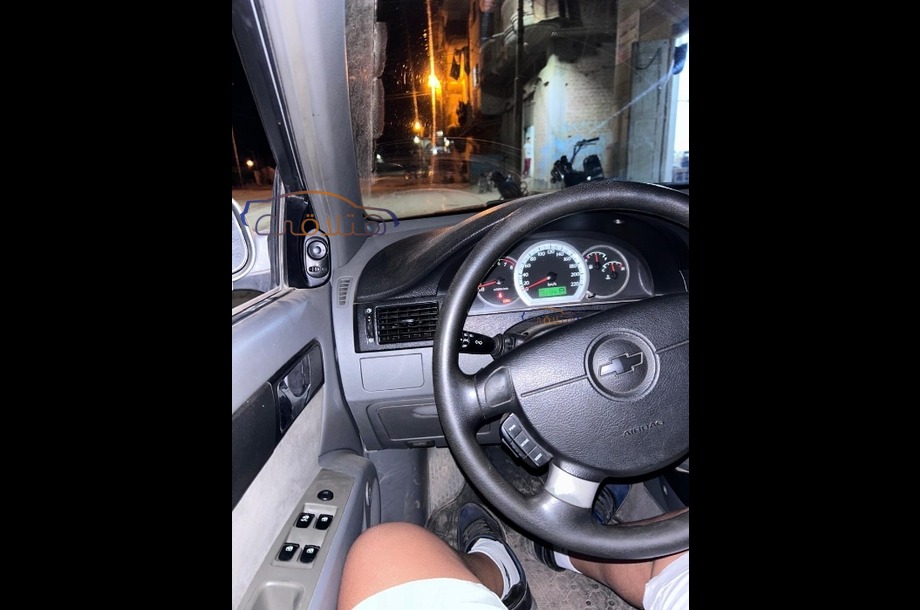 Optra Chevrolet فضي