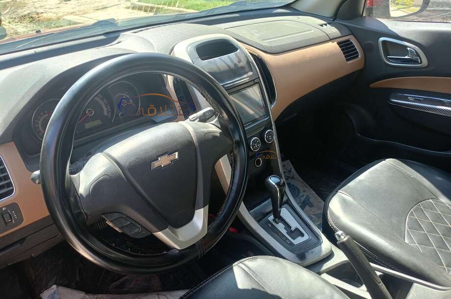 Optra Chevrolet احمر غامق