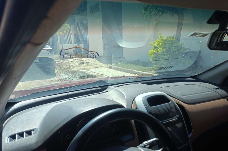 Optra Chevrolet احمر غامق