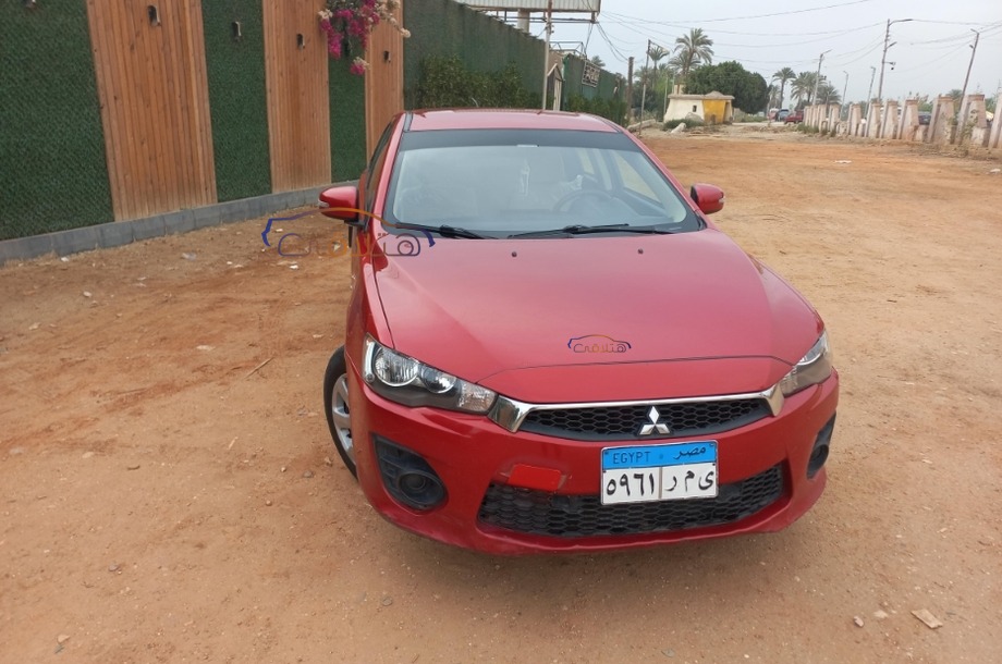 Lancer Mitsubishi 2017 Heliopolis Red 7089956 - Car for sale : Hatla2ee