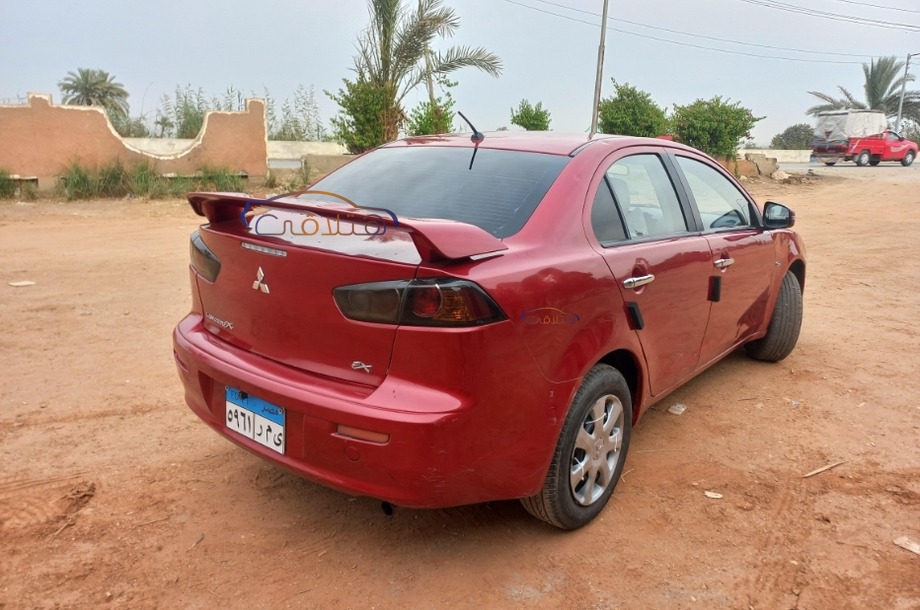 Lancer Mitsubishi 2017 Heliopolis Red 7089956 - Car for sale : Hatla2ee