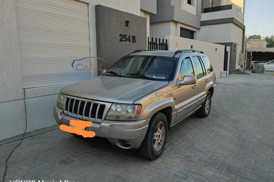 Grand Cherokee Jeep Gold