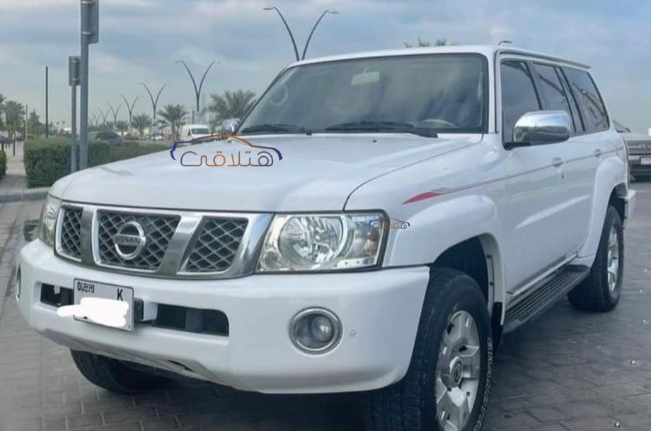 Patrol safari Nissan أبيض